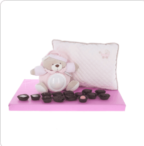 Adorable musical night light teddy and pillow, surrounded by Belgian pralines - girl