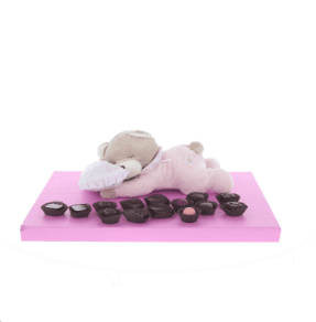 Pink musical sleeping teddy