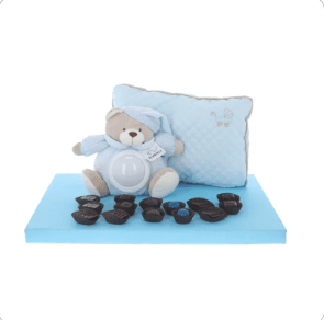 Adorable musical night light teddy and pillow, surrounded by Belgian pralines - boy